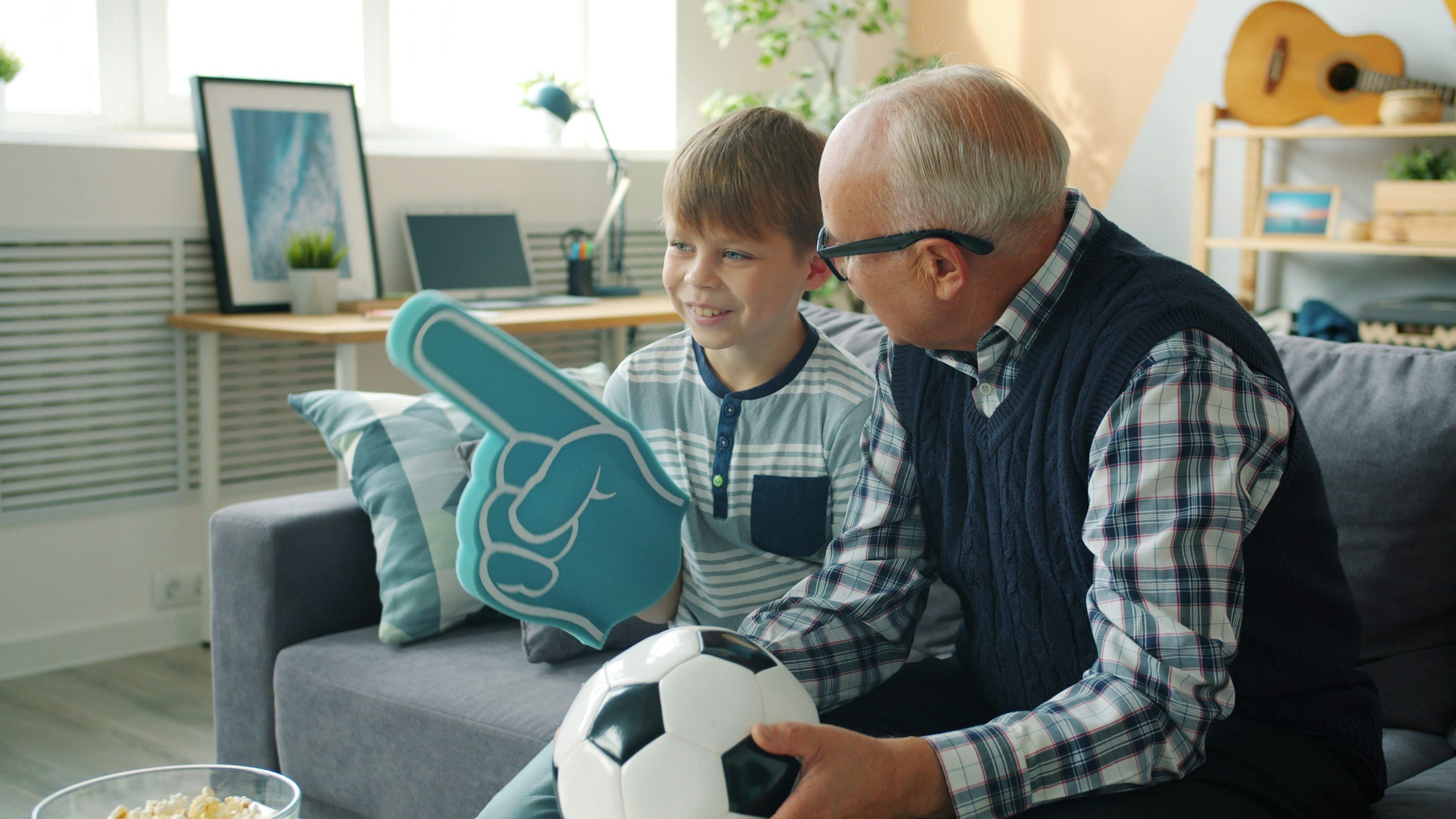Family streaming 4K IPTV content together on large television screen with Nordic IPTV