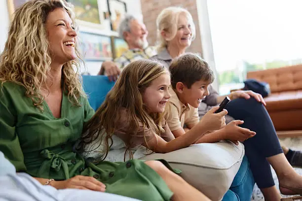 Extended family watching live sports on IPTV with Nordic IPTV annual subscription