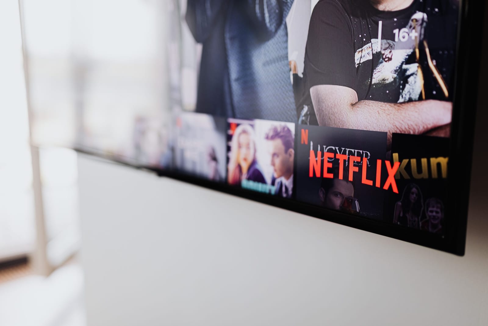 Person enjoying nordic iptv content on a tablet at home